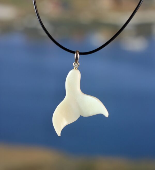 Whale tail pendant, hand carved.