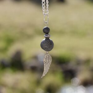 Lava stone necklace with silver-coloured wing charm